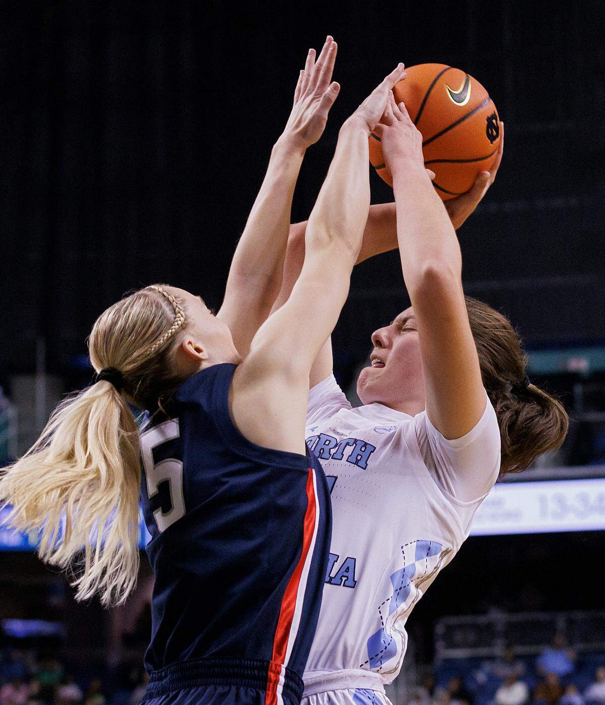 North Carolina’s Ciera Toomey looks to pass around UConn’s Paige Bueckers during the second half of the Tar Heels’ 69-58 loss on Friday, Nov. 15, 2024, at First Horizon Coliseum in Greensboro, N.C.