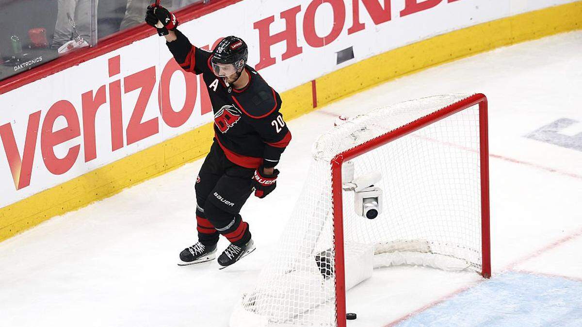 RALEIGH, NORTH CAROLINA - MAY 28: Sebastian Aho #20 of the Carolina Hurricanes celebrates after scoring a goal against the Florida Panthers during the first period in Game Five of the Eastern Conference Final of the 2025 Stanley Cup Playoffs at Lenovo Center on May 28, 2025 in Raleigh, North Carolina.  (Photo by Jared C. Tilton/Getty Images)