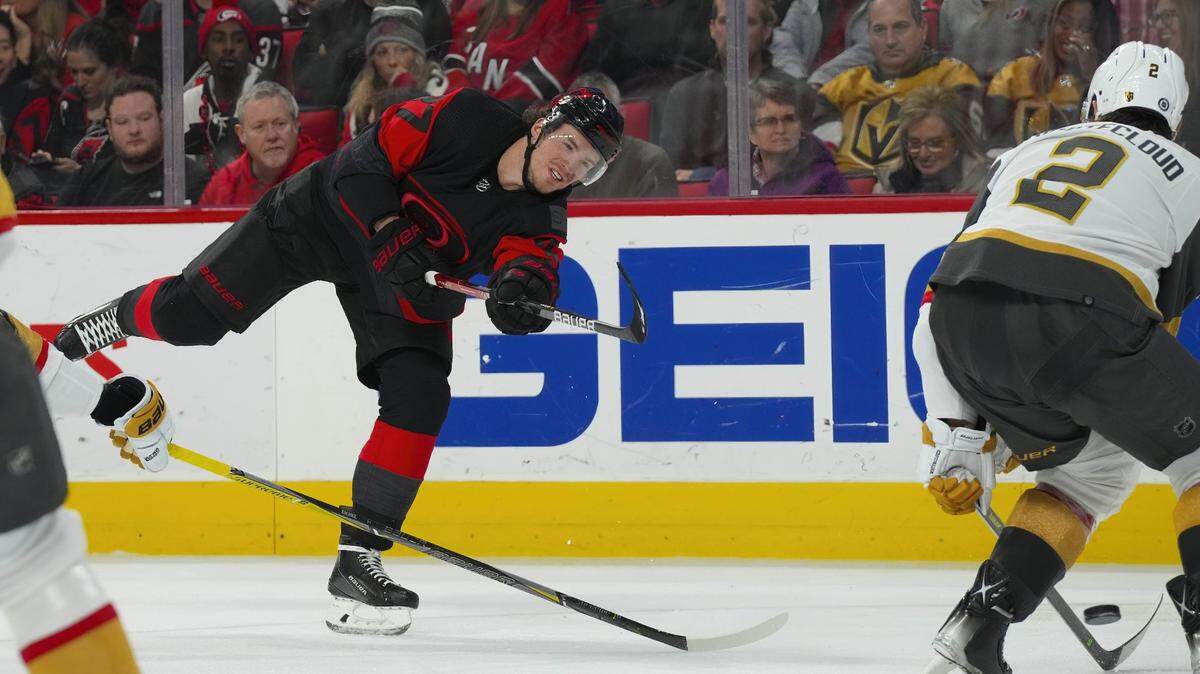 Carolina Hurricanes right wing Andrei Svechnikov (37) takes a shot against the Vegas Golden Knights during the third period at PNC Arena.