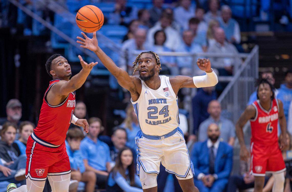 North Carolina’s Jae’Lyn Withers (24) makes a steal from Radford’s Daquan Smith (1) in the first half on Monday, November 6, 2023 at the Dean Smith Center in Chapel Hill, N.C.