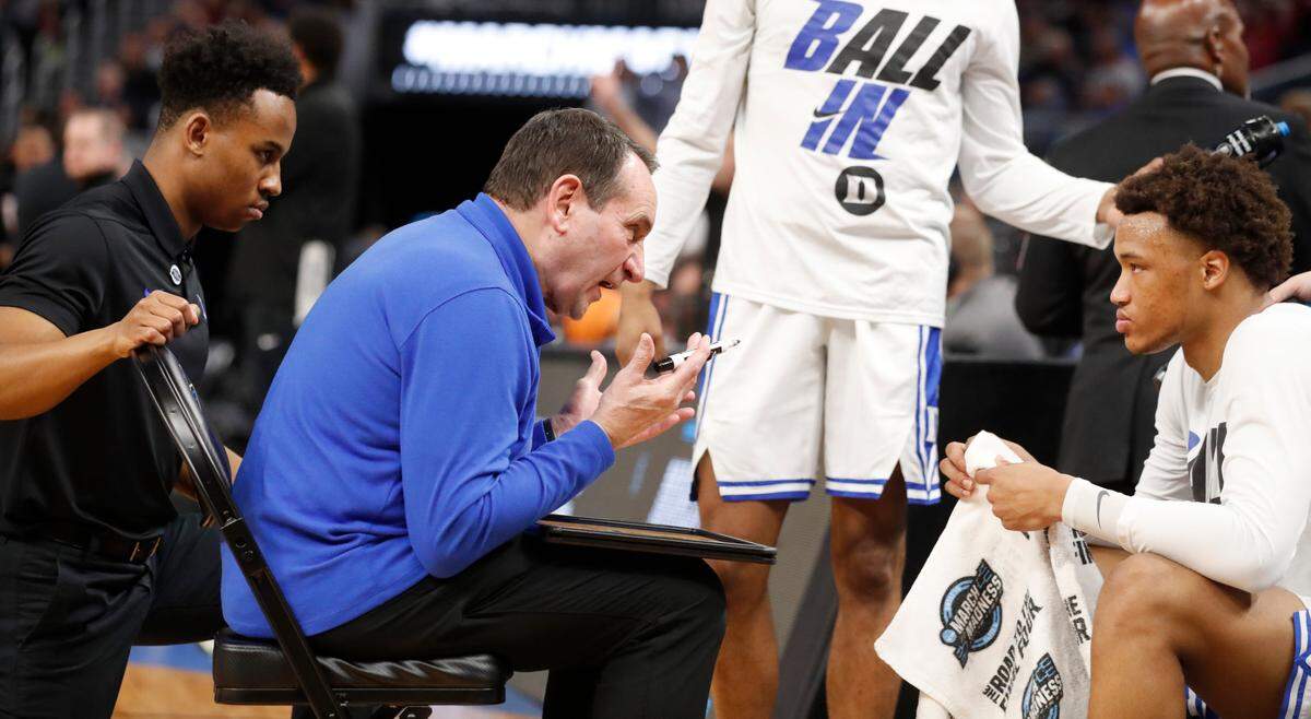 Duke head coach Mike Krzyzewski talks with Wendell Moore Jr. before the start of the second half of Duke’s 78-73 victory over Texas Tech in the Sweet 16 round of the NCAA Tournament at the Chase Center in San Francisco, Calif., Thursday, March 24, 2022.