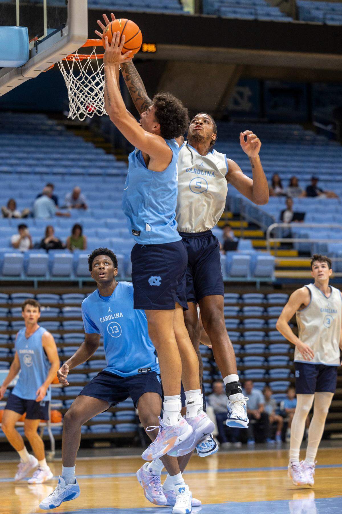 North Carolina’s Armando Bacot (5) blocks a shot by Zayden High (1) during the Tar Heels’ practice on Friday, October 6, 2023 at the Dean Smith Center in Chapel Hill, N.C.