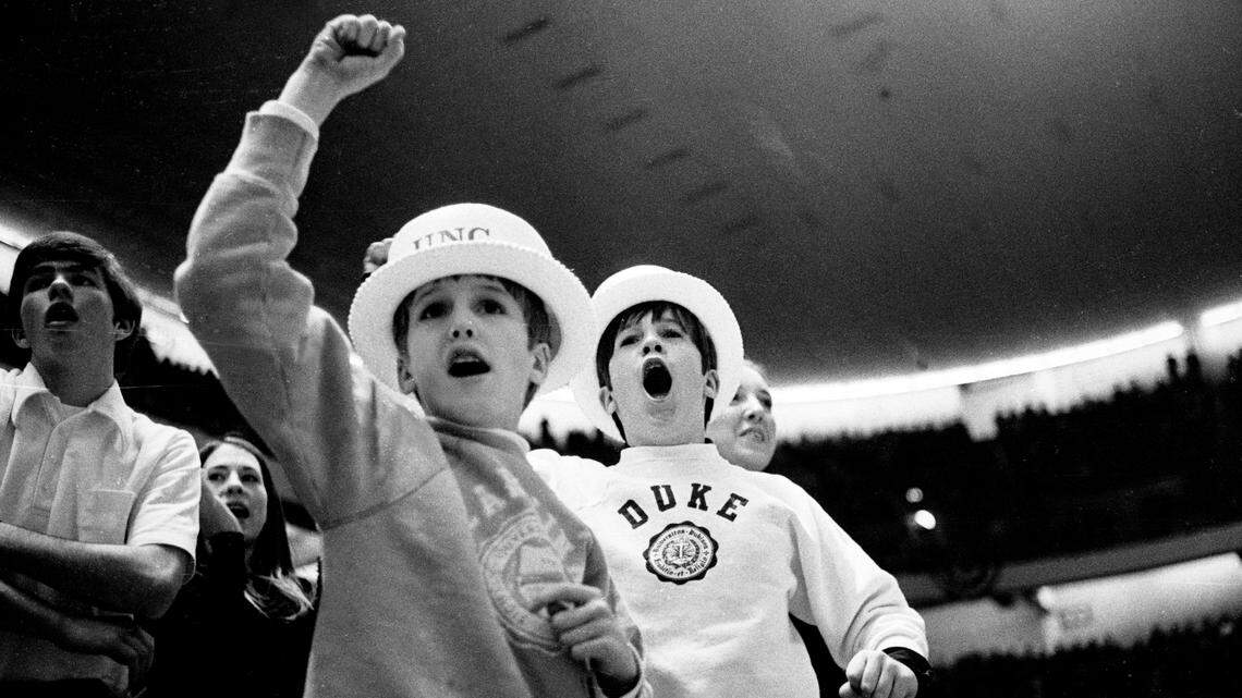 Young North Carolina and Duke fans cheer on the Blue Devils at the 1972 ACC Tournament in Greensboro.