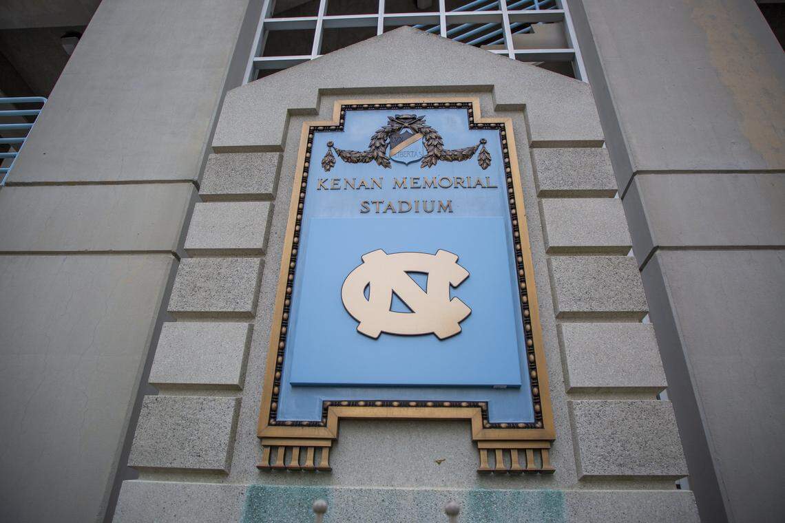 A plaque commemorating William Rand Kenan Sr., known to have a racist history, at Kenan Memorial Stadium has been covered by the UNC-Chapel Hill logo. Photo taken Thursday, Nov. 7, 2019, in Chapel Hill, NC.