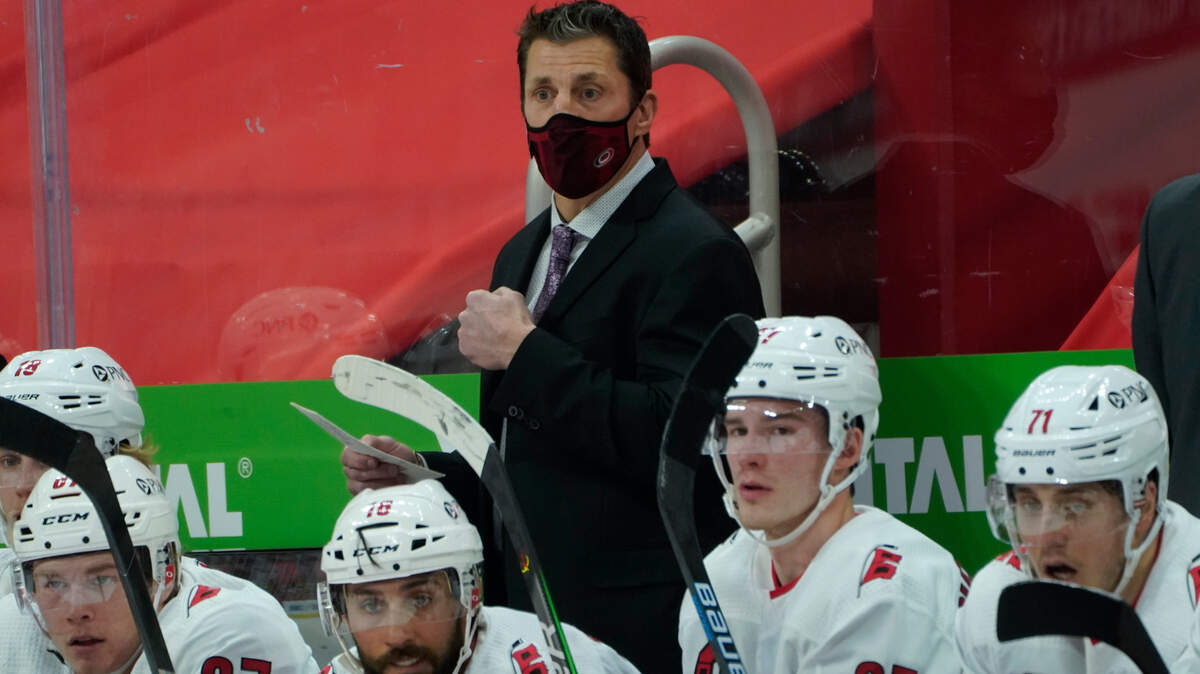 Carolina Hurricanes head coach Rod Brind’Amour wears a mask in game against the Detroit Red Wings on Saturday, Jan. 16, 2021, in Detroit. (AP Photo/Paul Sancya)