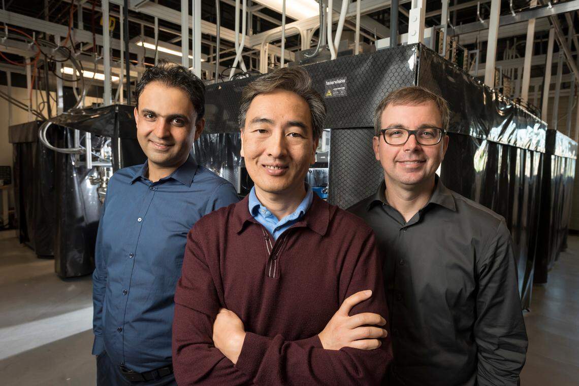 Duke University professors Iman Marvian, Jungsang Kim and Kenneth Brown gathered in 2018 at Kim’s ion-trap quantum lab in the Chesterfield Building in downtown Durham.