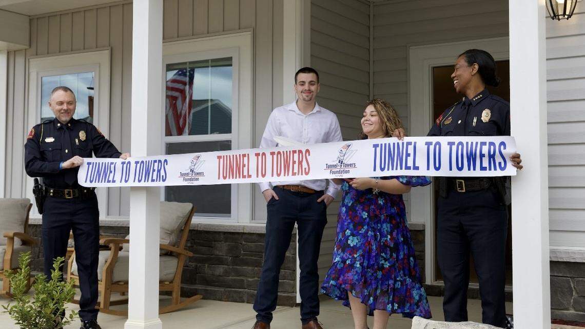 Family of Raleigh police officer killed in mass shooting receives mortgage-free home