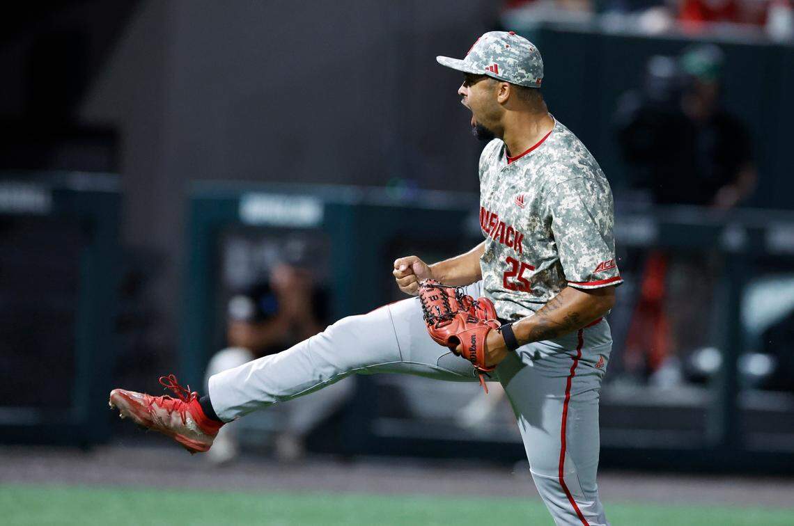N.C. State’s Derrick Smith (25) celebrates after striking out JMU’s Kyle Langley to end the game giving the Wolfpack a 5-3 victory over James Madison in the NCAA Raleigh Regional final at Doak Field Sunday, June 2, 2024.