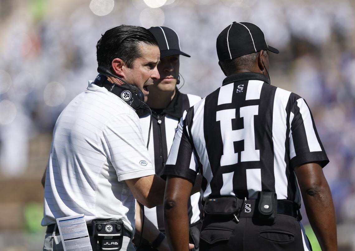 Duke head coach Manny Diaz speaks with officials during the first half of the Blue Devils’ game against Georgia Tech on Saturday, Oct. 18, 2025, at Wallace Wade Stadium in Durham, N.C.