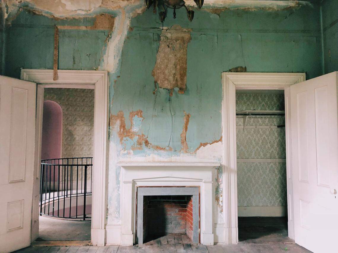 A room inside Montfort Hall. The home has extensive water damage.