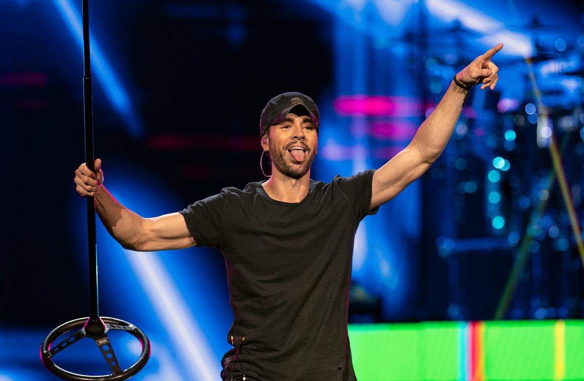 Enrique Iglesias acknowledges the crowd as he opens “The Trilogy Tour” at Raleigh, N.C.’s PNC Arena, Thursday night, Feb. 29, 2024.
