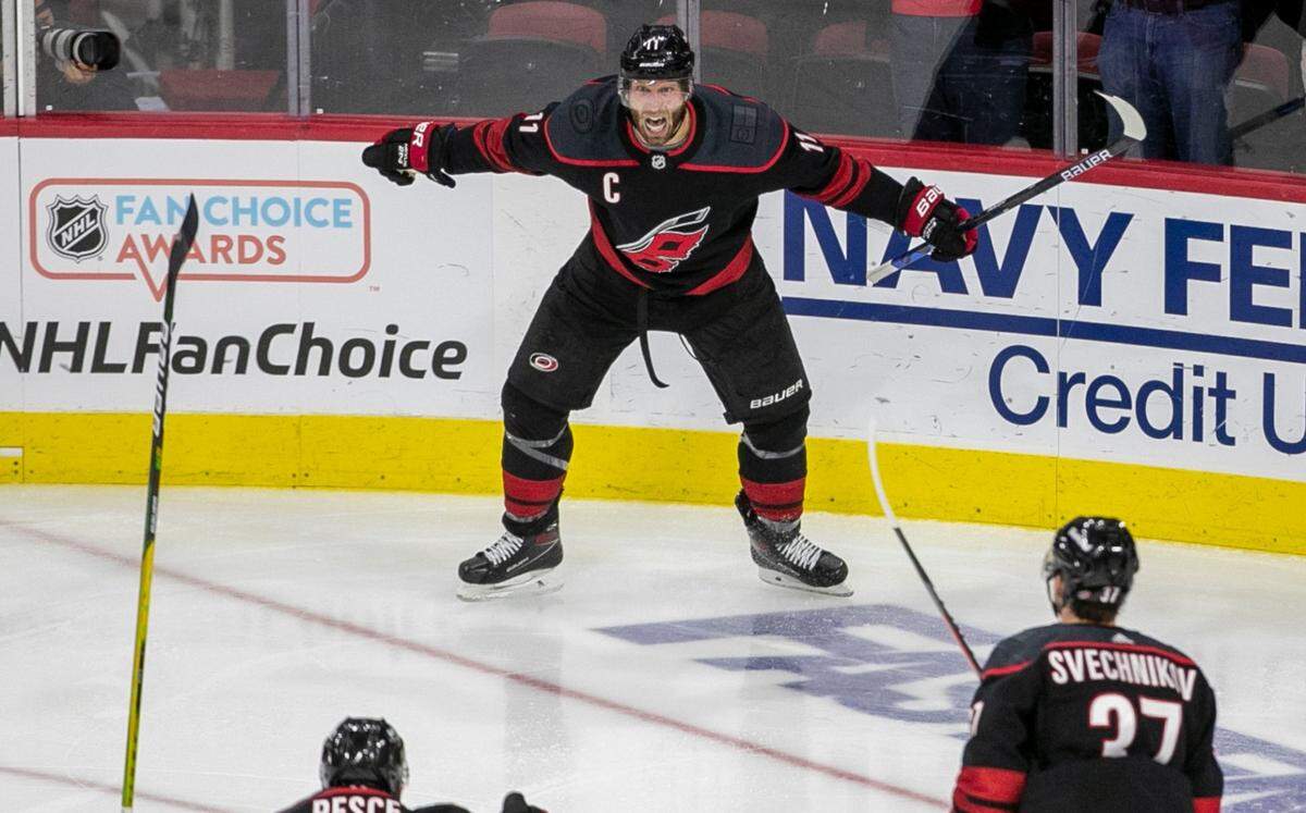 Carolina Hurricanes’ Jordan Staal (11) reacts after scoring in overtime to secure a 3-2 victory over Nashville in game five of their first round Stanley Cup Series on Tuesday, May 25, 2021 at PNC Arena in Raleigh, N.C.