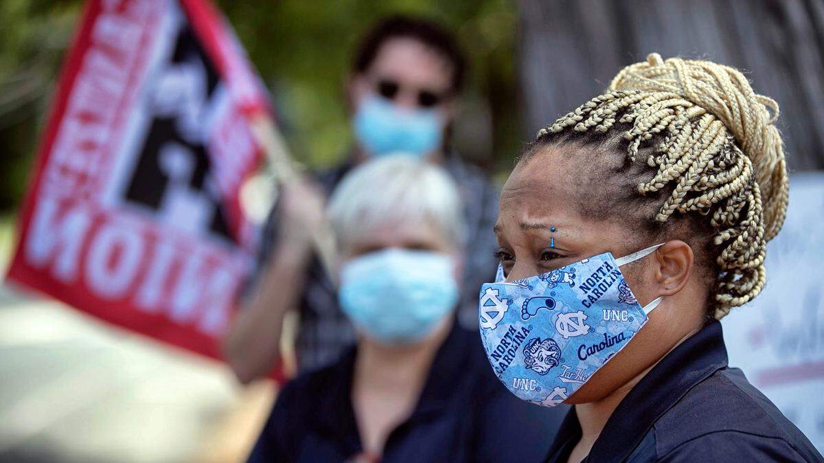 Penny Elliott, a UNC Housekeeping supervisor, speaks during a press conference calling for better protective equipment and protocols for workers and students amid the COVID-10 pandemic on Wednesday, July 22, 20202 in Chapel Hill, N.C