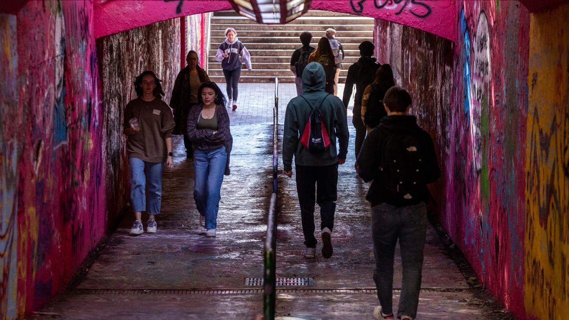 Students traverse the Free Expression Tunnel on N.C. State’s main campus Monday, Feb. 13, 2022.