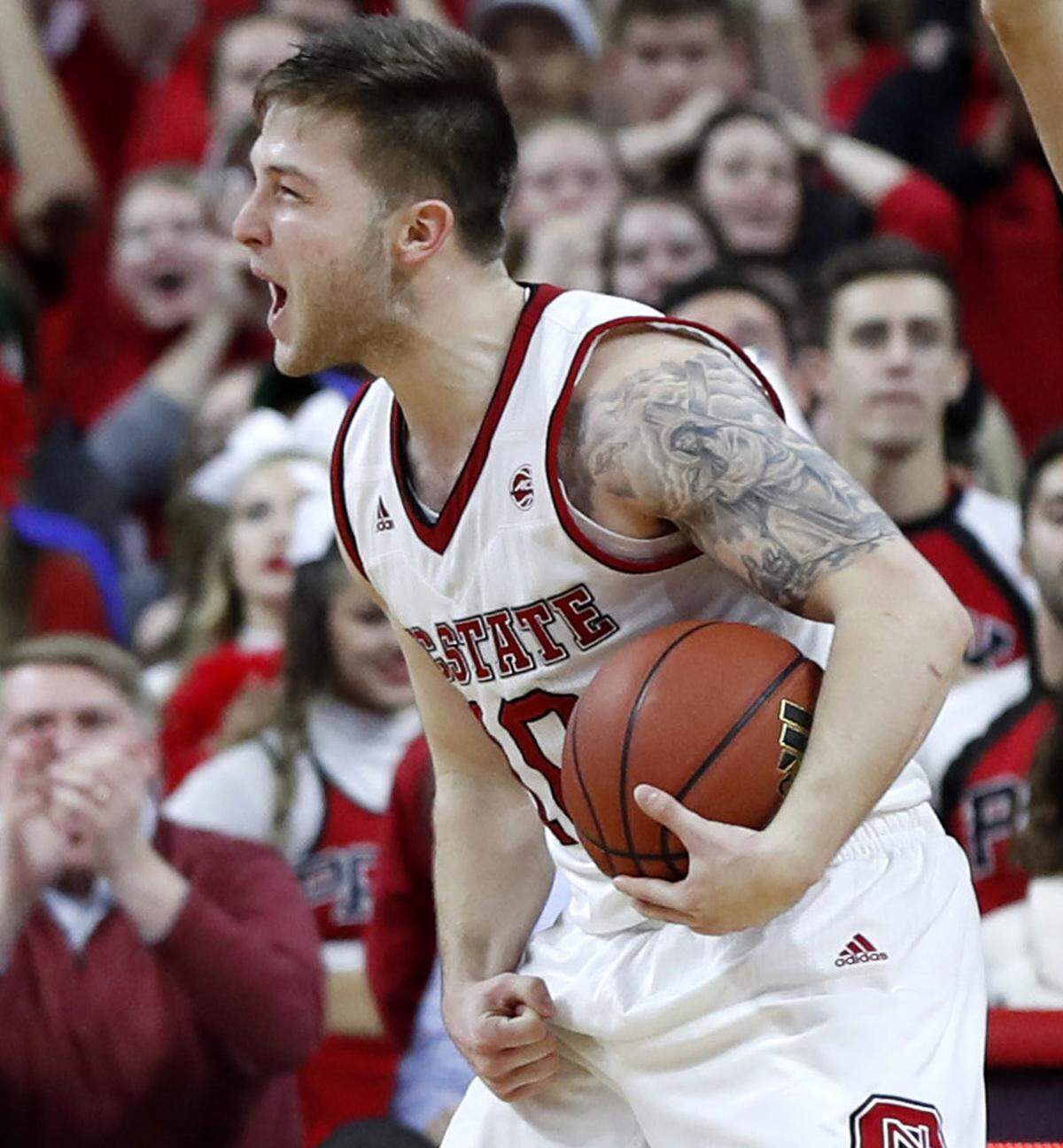 N.C. State’s Braxton Beverly (10) celebrates after stealing the ball from Duke’s Trevon Duval late in N.C. State’s 96-85 victory over Duke at PNC Arena in Raleigh Saturday, Jan. 6, 2018.