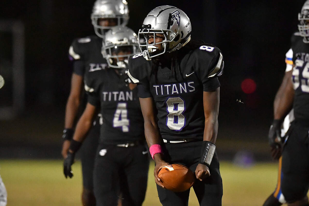 South Garner Chase Hardy (8) reacts to a play against Garner during the first half. The South Garner Titans and the Garner Trojans met in a conference football game in Raleigh, N.C. October 17, 2025