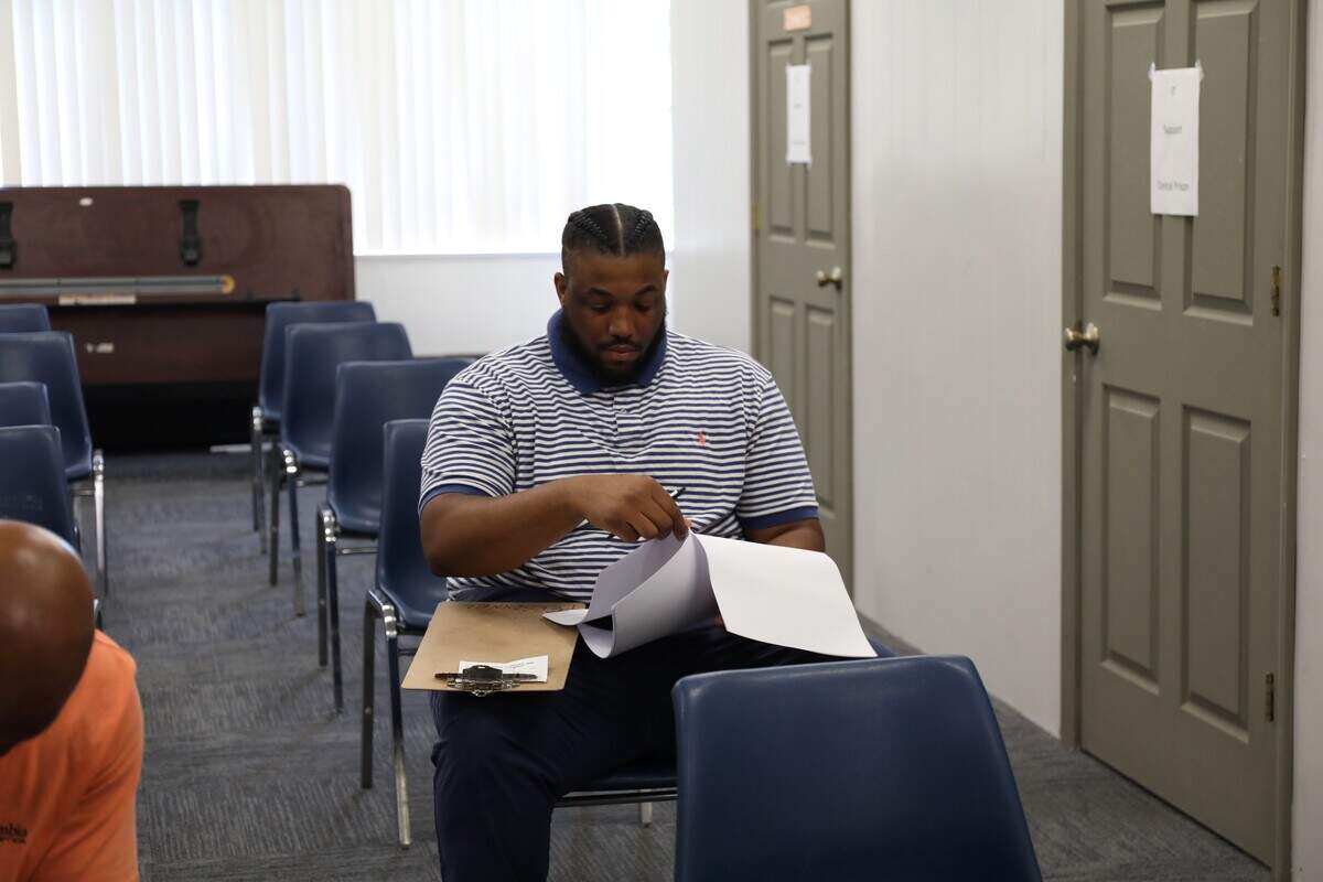 Jerome Yow fills out an application to work in the North Carolina Department of Adult Correction on Thursday, June 4, 2026, at Central Prison.