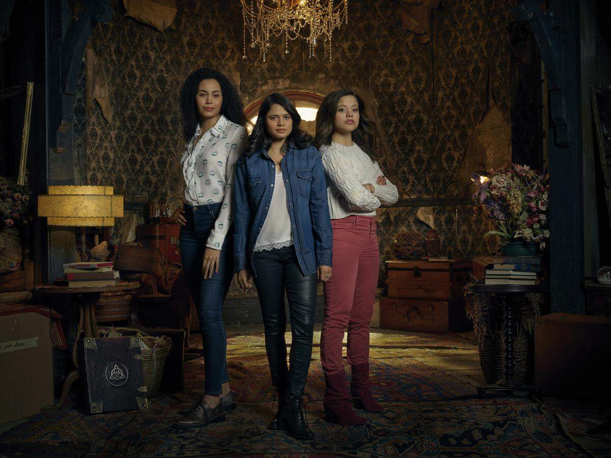 (L-R): Madeleine Mantock as Macy Vaughn, Melonie Diaz as Mel Vera and Sarah Jeffery as Maggie Vera in CW’s reboot of “Charmed.”
