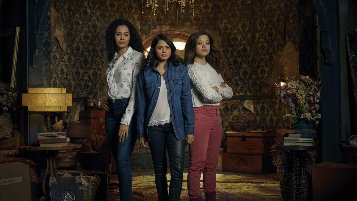 (L-R): Madeleine Mantock as Macy Vaughn, Melonie Diaz as Mel Vera and Sarah Jeffery as Maggie Vera in CW’s reboot of “Charmed.”