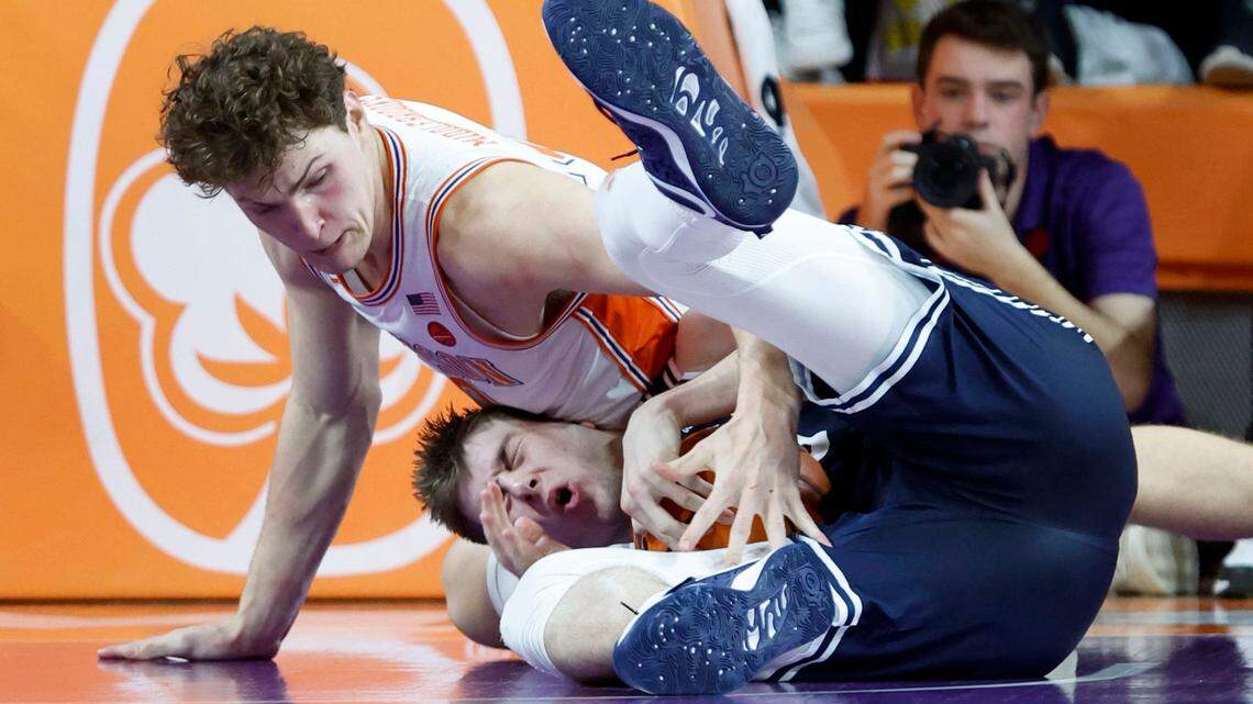Duke’s Kyle Filipowski (30) and Clemson’s Ben Middlebrooks (10) fight for the ball during the second half of Clemson’s 72-64 victory over Duke at Littlejohn Coliseum in Clemson, S.C., Saturday, Jan. 14, 2023.