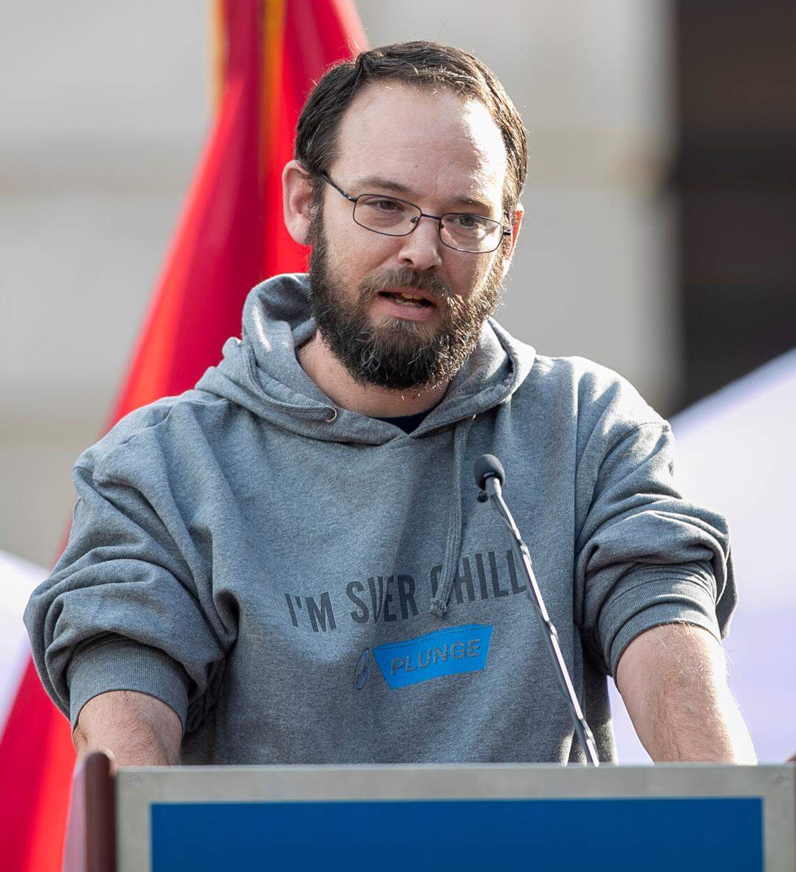 Robert Steele, the fiancé of Mary Marshall, one of the victims of the mass shooting in the Hedingham neighborhood, speaks during a vigil for shooting victims on Sunday, October 23, 2022 on Lichtin Plaza at Raleigh Memorial Auditorium in Raleigh, N.C.