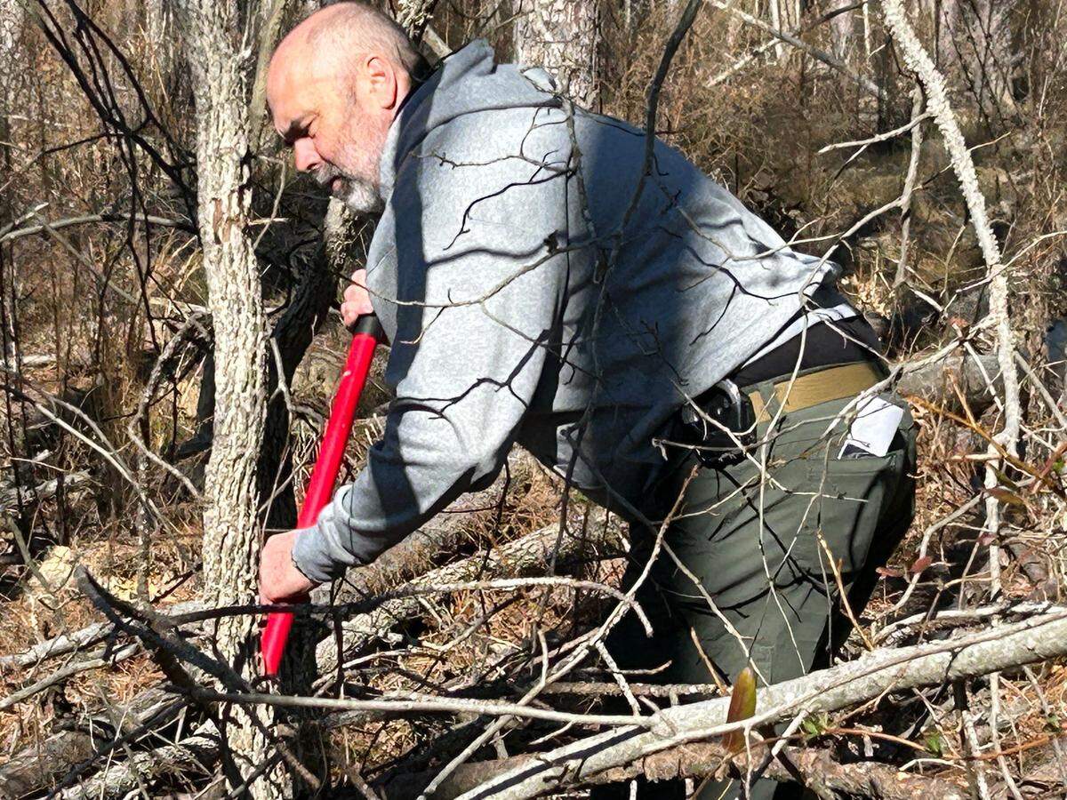 Walter Brown, a Northampton County sheriff’s deputy retired from the SBI, leads a search for Daniel Moses near Rich Square.