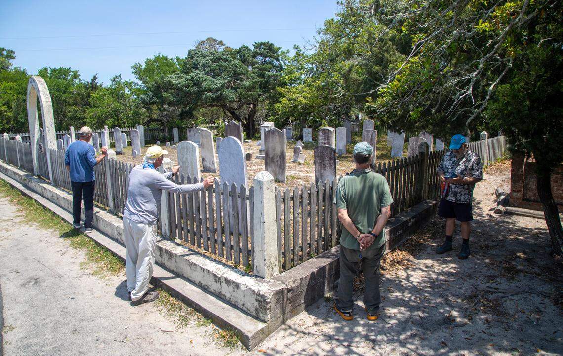 Tourists visit the British Cemetery in Ocracoke Wednesday, May 18, 2022.