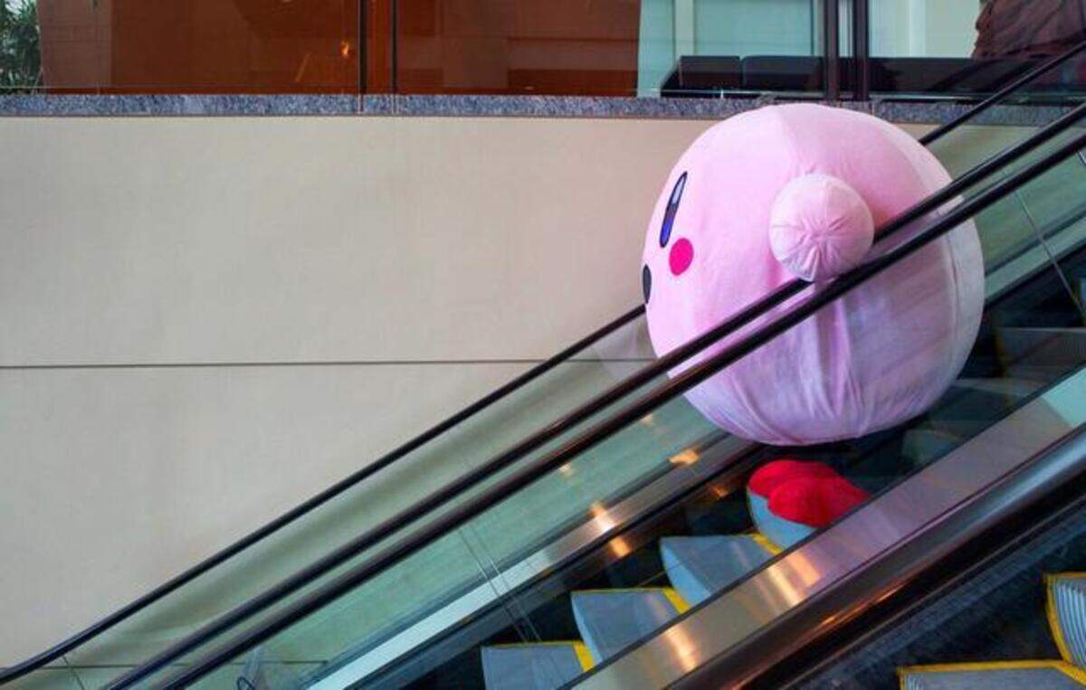 A character is spotted traveling down the escalator during the Animazement convention in the Raleigh Convention Center in 2014.