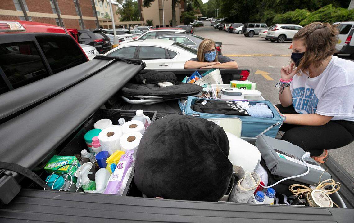 Heather Bell and her daughter Chloe Bell, a freshman from Concord, N.C., move out of Granville West on Friday afternoon August 21, 2020 in Chapel Hill, N.C. Chloe was a resident of Granville Towers for only 15 days after a COVID-19 outbreak on campus forced the university to move to online classes.