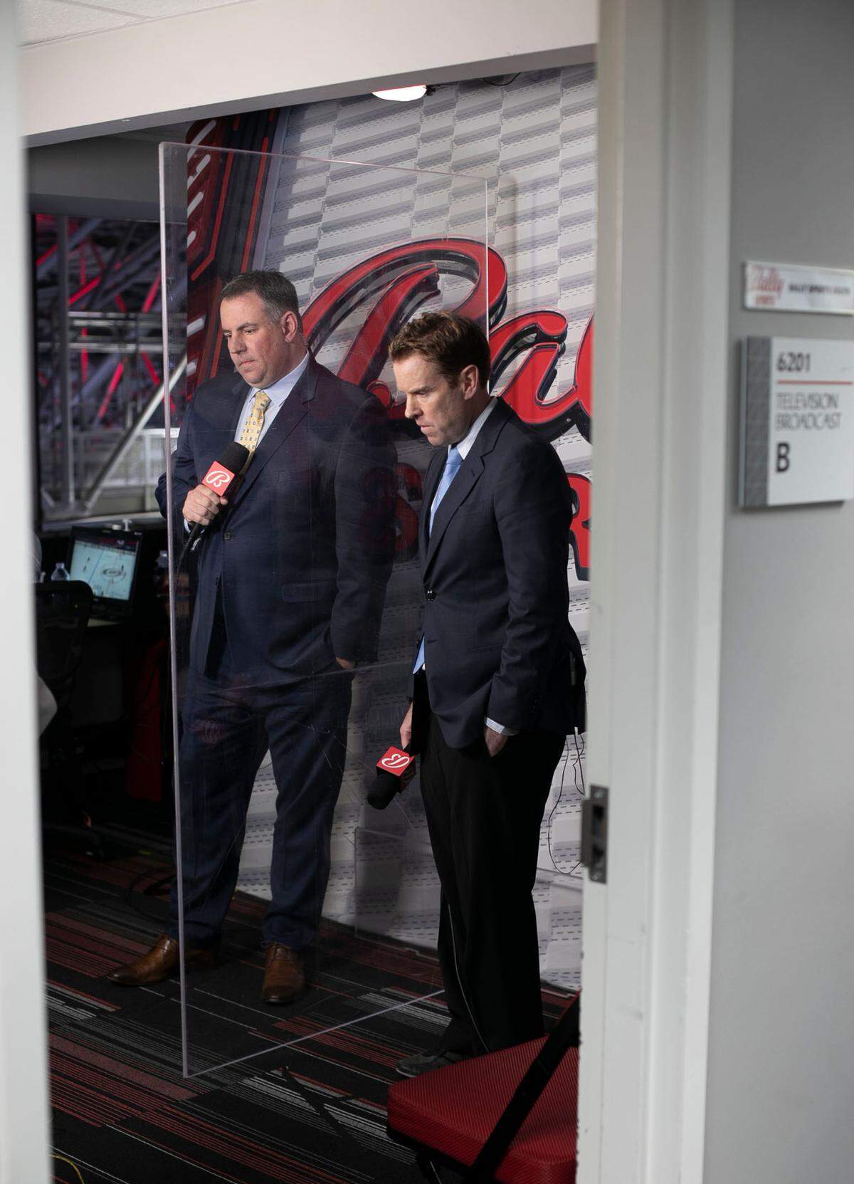 Hurricanes’ television play-by-play announcer Mike Maniscalco and analyst Tripp Tracy prepare for their broadcast of game two of the Carolina Hurricanes vs. Nashville series on Wednesday, May 19, 2021 at PNC Arena in Raleigh, N.C. Maniscalco replaces John Forslund who left after 25 years, unable to negotiate a new contract