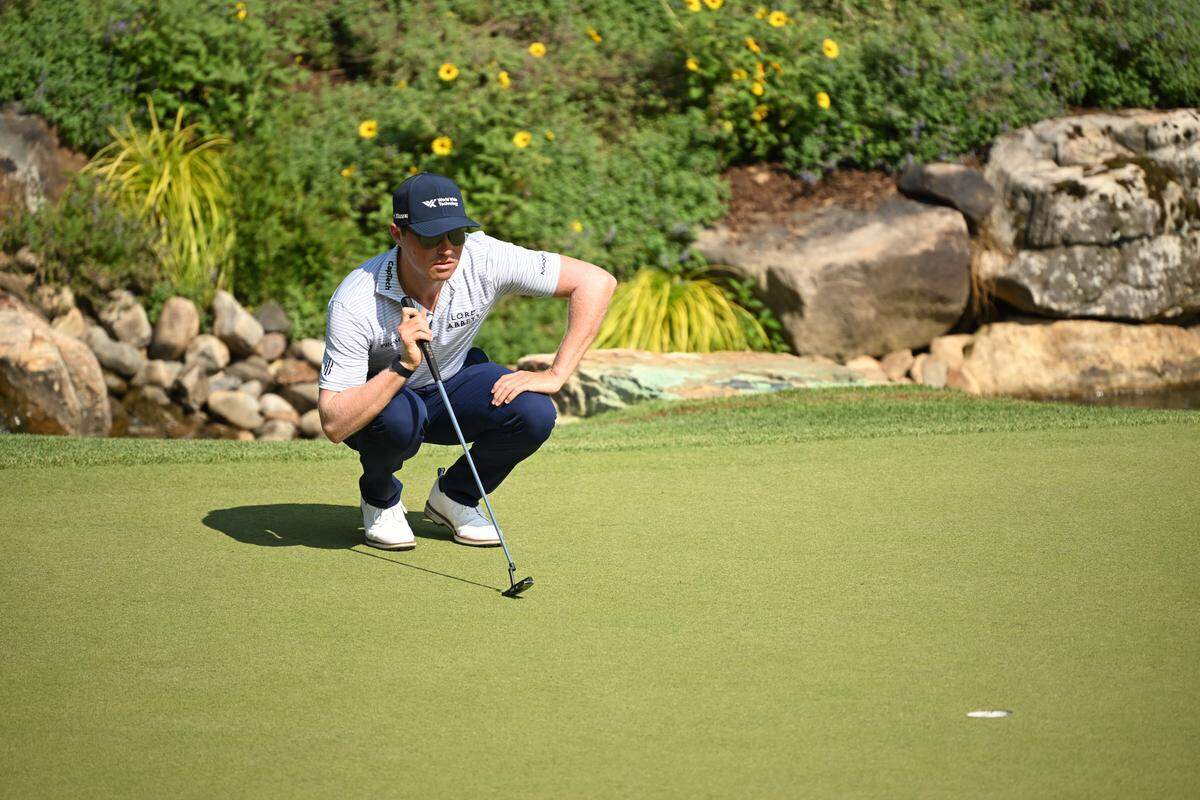 Ben Griffin lines up a putt on the 18th hole during the third round of the BMW Championship golf tournament. 