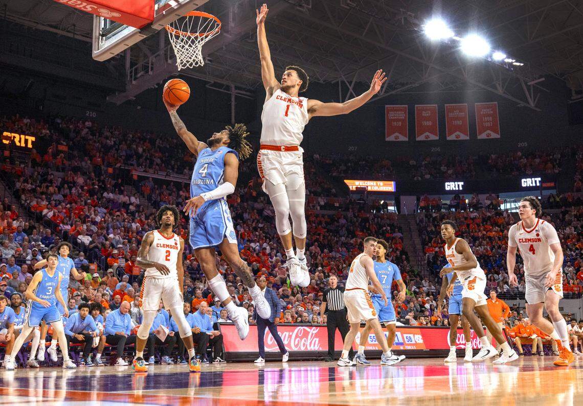North Carolina’s R.J. Davis (4) drives to the basket against Clemson’s Chase Hunter (1) in the second half on Saturday, January 6, 2024 at Littlejohn Coliseum in Clemson, S.C. Davis scored 14 points in the Tar Heels’ 65-55 victory.