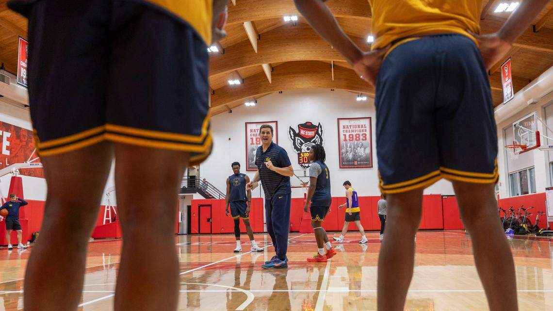 California coach Mark Madsen works with his player during their practice at N.C. State’s Dial Basketball Center on Friday, January 17, 2025 in Raleigh, N.C.