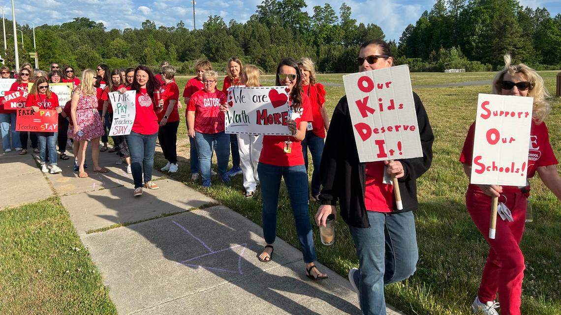 Teachers hold a “walk-in” at Abbotts Creek Elementary School in Raleigh, N.C., on April 30, 2024 to lobby the Wake County school board to include bigger raises in the school budget.