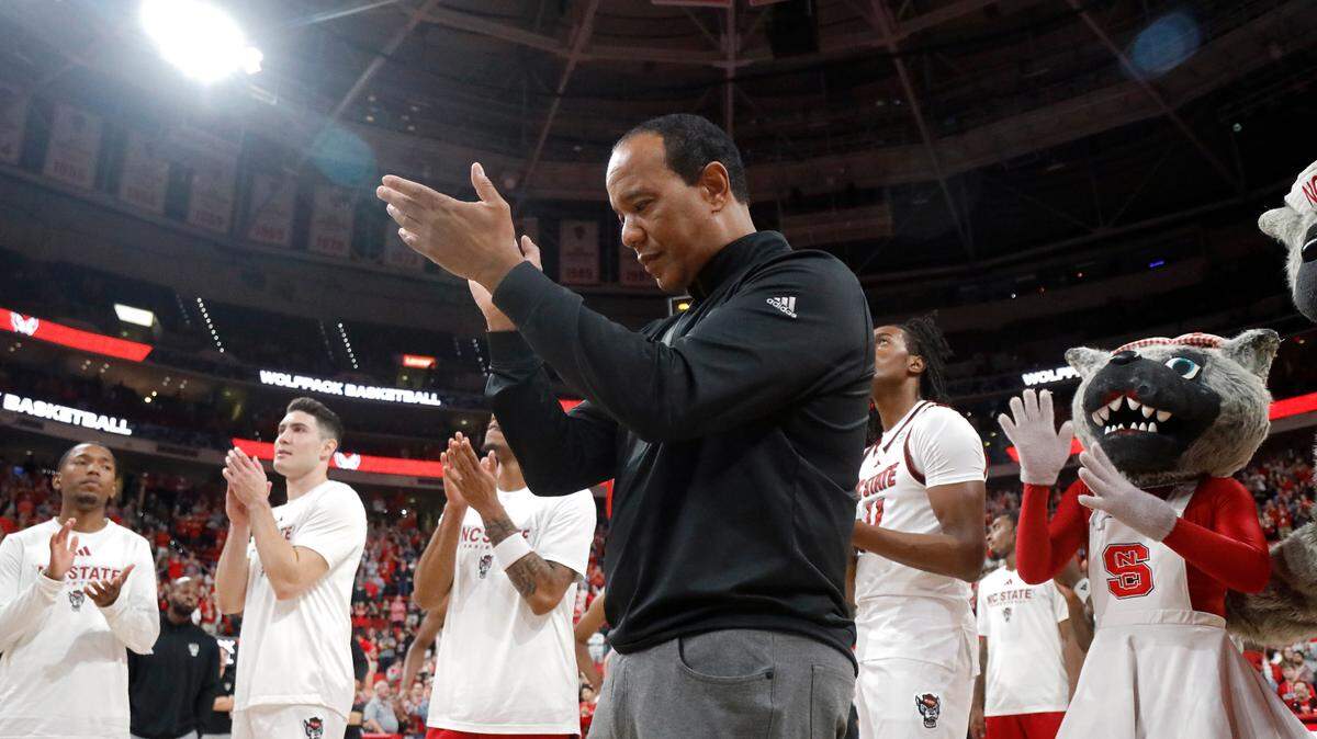 N.C. State head coach Kevin Keatts applauds during a highlight video of the Wolfpack’s 2024 postseason run prior to N.C. State’s season opening game against USC Upstate on Monday, Nov. 4, 2024, at the Lenovo Center in Raleigh, N.C.