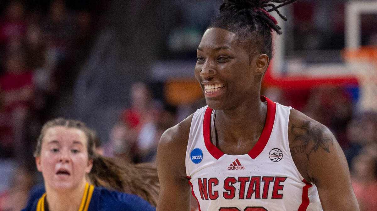 NC State’s Saniya Rivers (22) smiles after stealing the ball from Chattanooga during the second half of the first round of the NCAA Division I Women’s Basketball Championship at Reynolds Coliseum in Raleigh, NC on Saturday, March 23, 2024. N.C. State won 64-45.