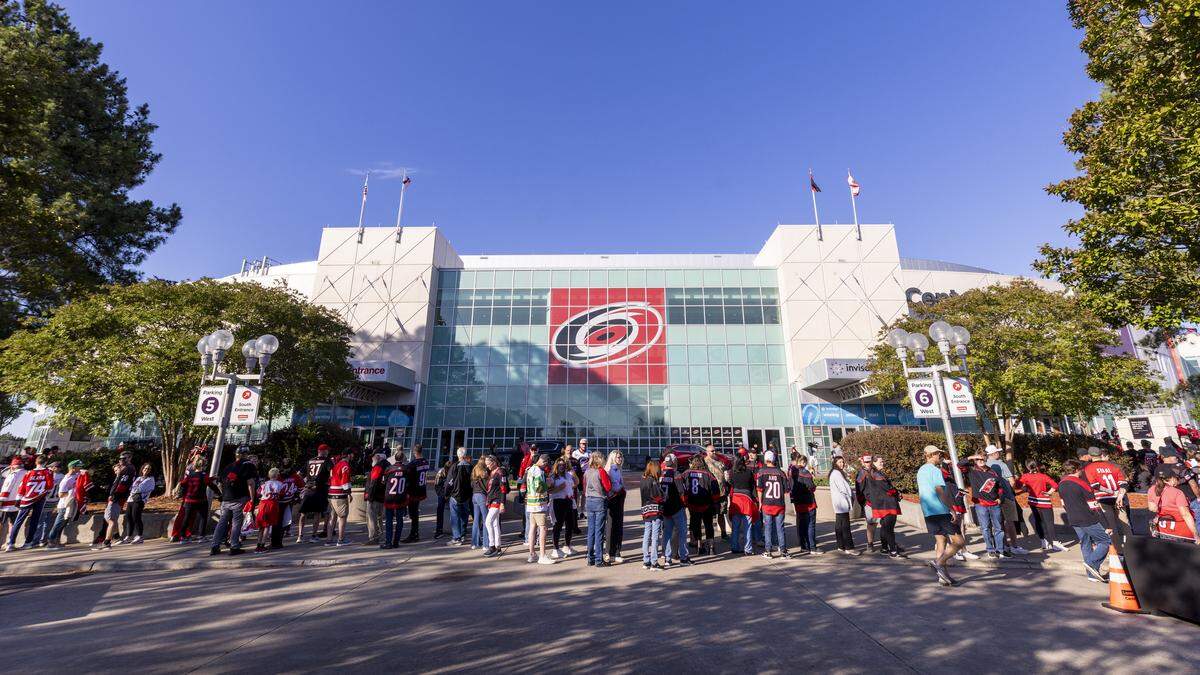 Carolina Hurricanes fans get ready for Game 1 of the Stanley Cup Final outside the Lenovo Center in Raleigh on Tuesday, June 2, 2026. For the first time since 2006, the Hurricanes are playing in the Stanley Cup Final, facing the Vegas Golden Knights, who won the Stanley Cup in 2023.