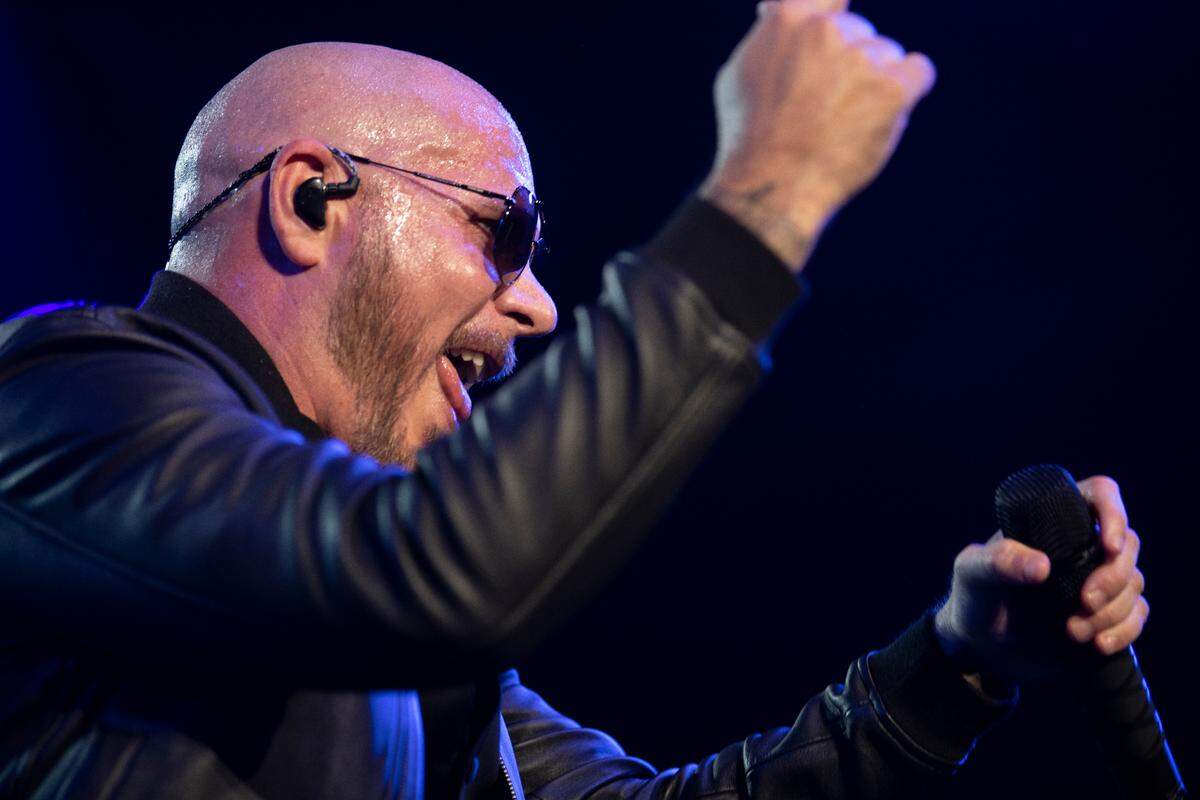Pitbull works the crowd as he opens his North American tour at Coastal Credit Union Music Pavilion at Walnut Creek in Raleigh, N.C., Thursday night, July 28, 2022.