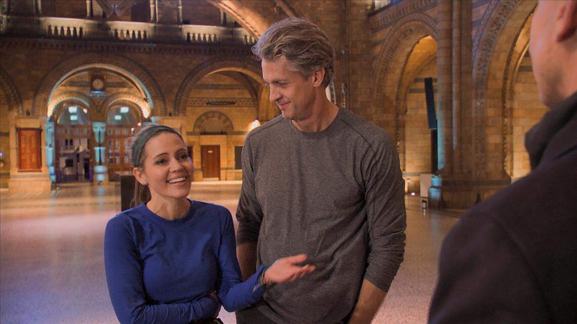 “We’re Back!” – THE AMAZING RACE begins its historic 33rd trip around the world when 11 new teams take off from their homes and travel to their first destination, London, England, on the special two-hour season premiere of THE AMAZING RACE, Wednesday, Jan. 5 (8:00-10:00 PM, ET/PT) on the CBS Television Network, and available to stream live and on demand on Paramount+*. The historic season began filming in February 2020, but after three legs was forced to halt production due to the COVID-19 pandemic. Over one and a half years later and the longest pitstop in the show’s history, THE AMAZING RACE resumed and concluded production this fall. Phil Keoghan is the host. Pictured L-R: Kim Holderness, Penn Holderness. Photo: Screengrabs/CBS ©2020 CBS Broadcasting, Inc. All Rights Reserved