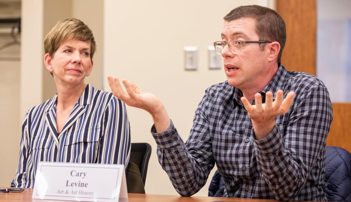 UNC-Chapel Hill professor Cary Levine talks to Provost Bob Blouin during a Faculty Executive Committee meeting held to address the settlement between the UNC Board of Governors and N.C. Sons of Confederate Veterans, giving them ‘Silent Sam’ and $2.5 million dollars, on Monday, Dec. 9, 2019, in Chapel Hill, NC.