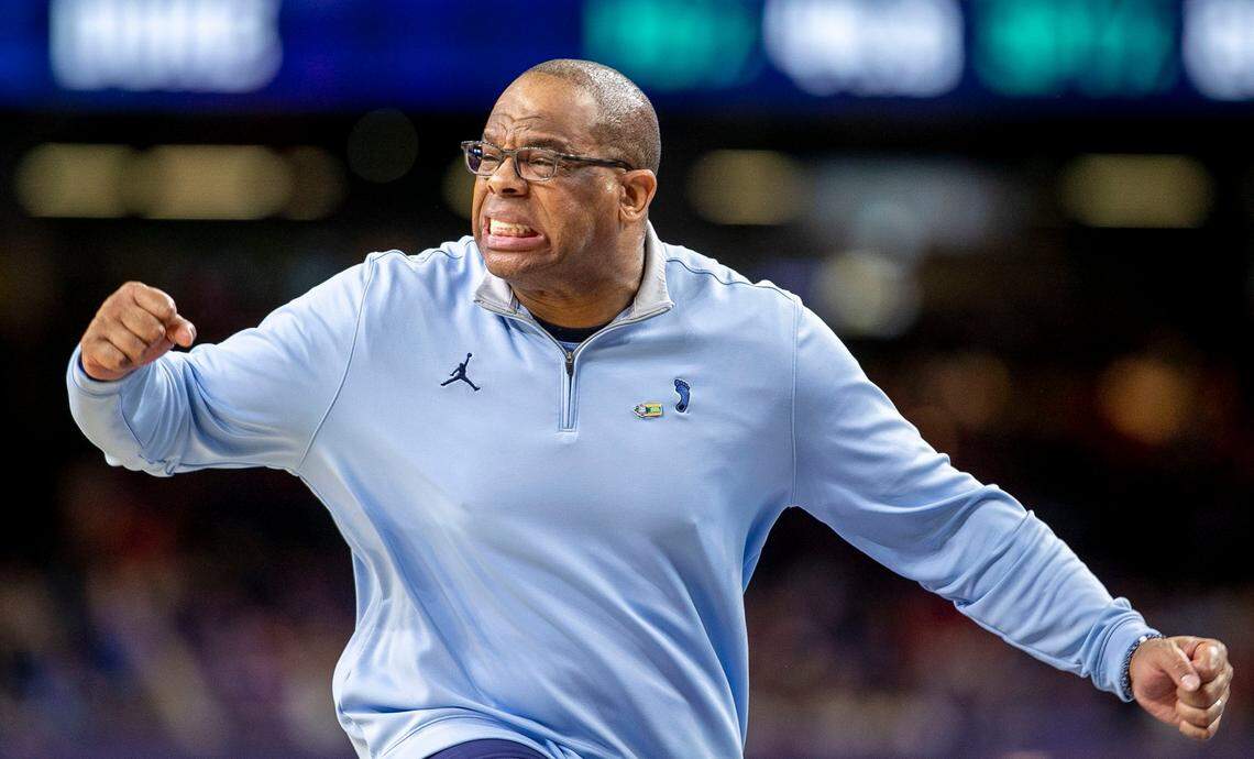 North Carolina coach Hubert Davis reacts after taking a 62-59 lead in second half against Duke during the NCAA Final Four semi-final on Saturday, April 2, 2022 at Caesars Superdome in New Orleans, La