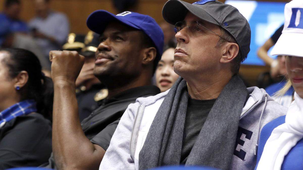 Duke parents Jerry Seinfeld, right and David Robinson watch during Duke’s 89-55 victory over Colorado State at Cameron Indoor Stadium in Durham, N.C., Friday, Nov. 8, 2019.