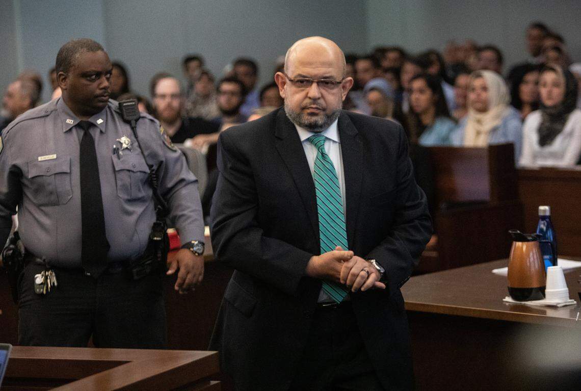 Dr. Muhammed Abu-Salha, the father of Yusor and Razan Abu-Salha, prepares to make a statement after Craig Hicks pleaded guilty to first-degree murder in the 2015 murders of three young Muslims at a Chapel Hill apartment Wednesday, June 12, 2019 at the Durham County Courthouse. Hicks will serve a life sentence in prison without the possibility of parole for killing his neighbors at the Finley Forest Condominiums: Deah Barakat, 23, his wife Yusor Abu-Salha, 21, and her sister Razan Abu-Salha, 19.
