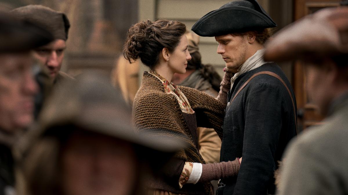 Caitriona Balfe (Claire), left, and Sam Heughan (Jamie) in Season 4 of the STARZ series “Outlander.”