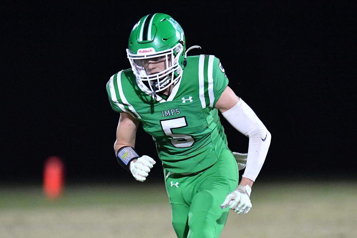 Cary's Erich Grena (5) runs for open field position against Middle Creek during the first half. The Cary Imps and the Middle Creek Mustangs met in a conference football game in Cary, N.C. on October 24, 2025