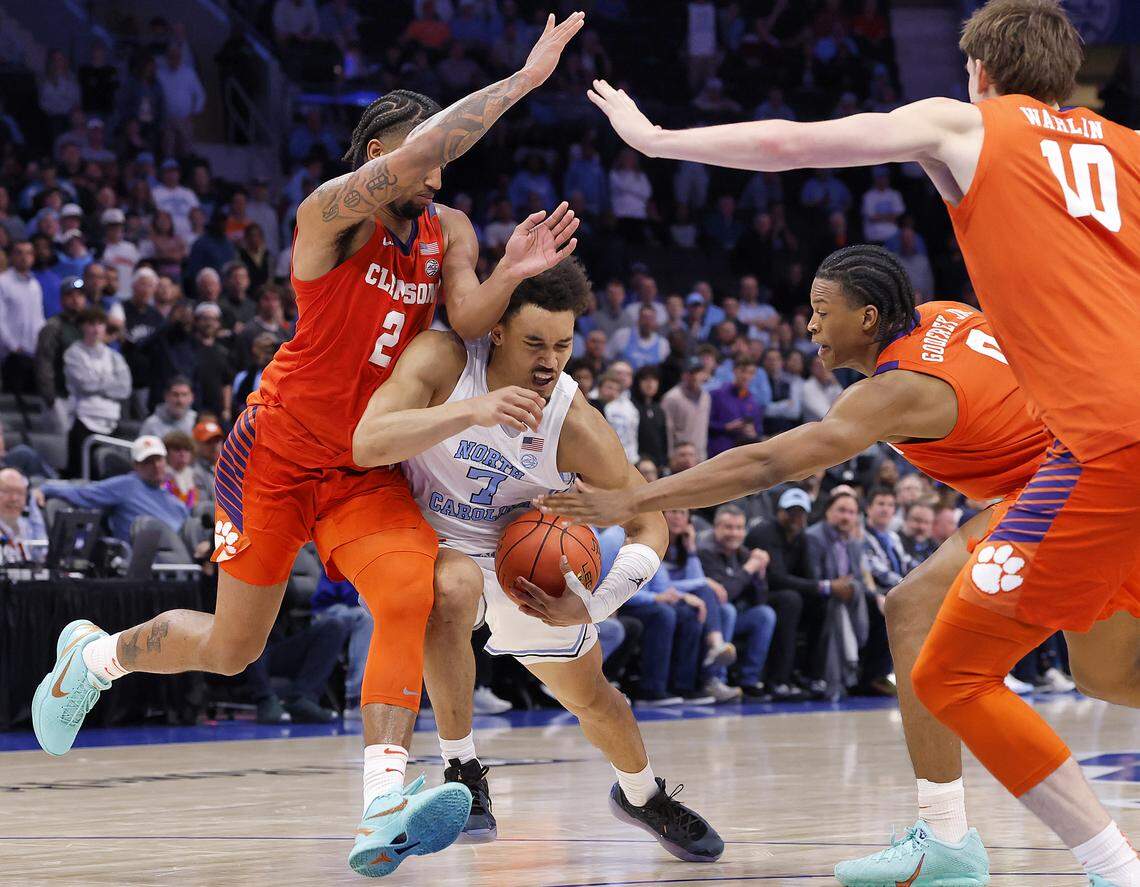 North Carolina's Seth Trimble is swarmed by the Clemson defense during the second half of the Tar Heels’ 80-79 loss in the ACC Tournament quarterfinals on Thursday, March 12, 2026, at the Spectrum Center in Charlotte, N.C.