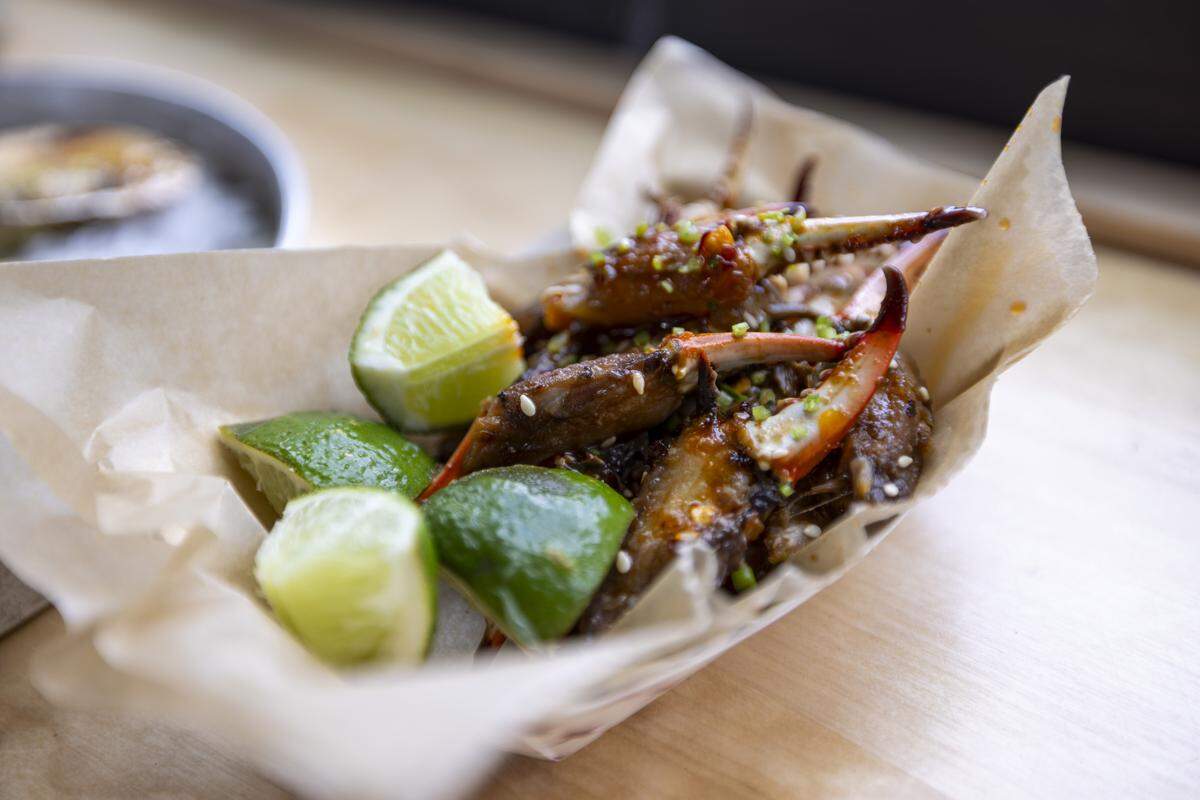 In addition to crab claws, Lawrence Barbecue serves oysters and other seafood dishes including ceviche, made with North Carolina seafood.