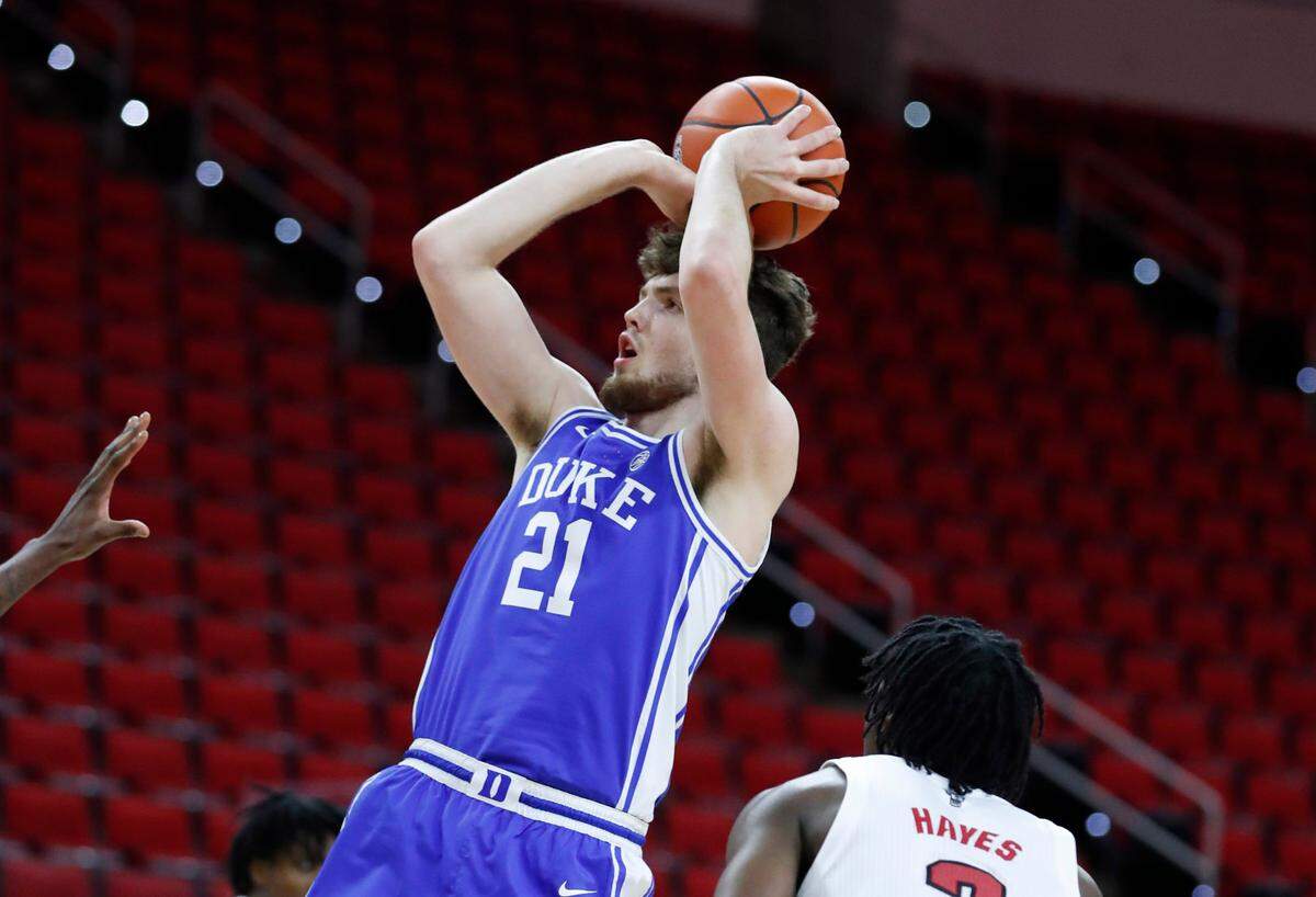 Duke’s Matthew Hurt (21) shoots during the second half of Duke’s 69-53 victory over N.C. State at PNC Arena in Raleigh, N.C., Saturday, February 13, 2021.