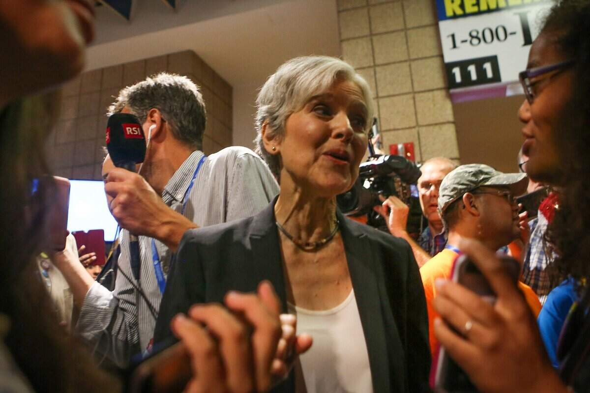 Jul 25, 2016; Phildelphia, PA, USA; Green Party presidential candidate Jill Stein (C) speaks to supporters while being heckled by detractors during the 2016 Democratic National Convention at Wells Fargo Arena. Mandatory Credit: Daniel Sato-THE NEWS JOURNAL