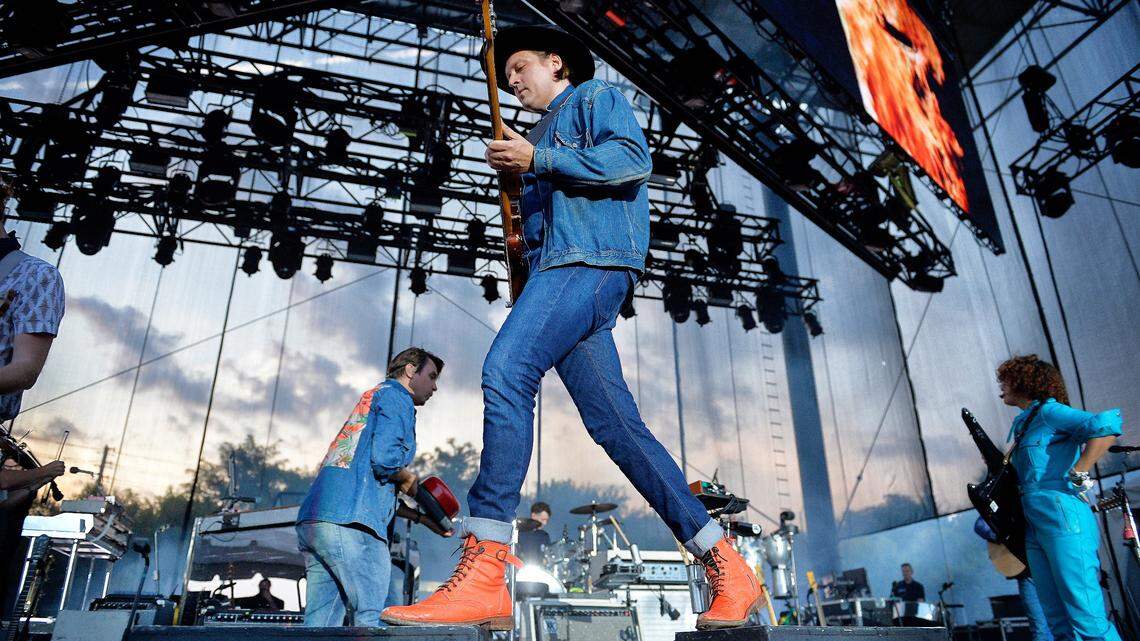Arcade Fire brings its “Everything Now Continued Tour,” at Raleigh, N.C.’s Red Hat Amphitheater, Thursday night, July 12, 2018.